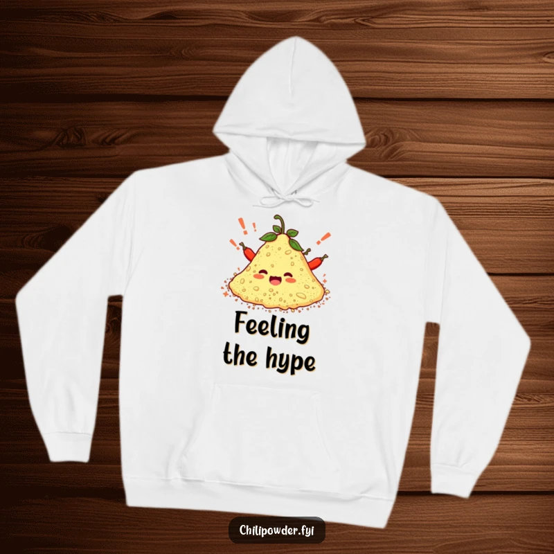 Funny hoodie showcasing a pile of chili powder character cheering with exclamation marks, offering warmth and a boost of spicy motivation.