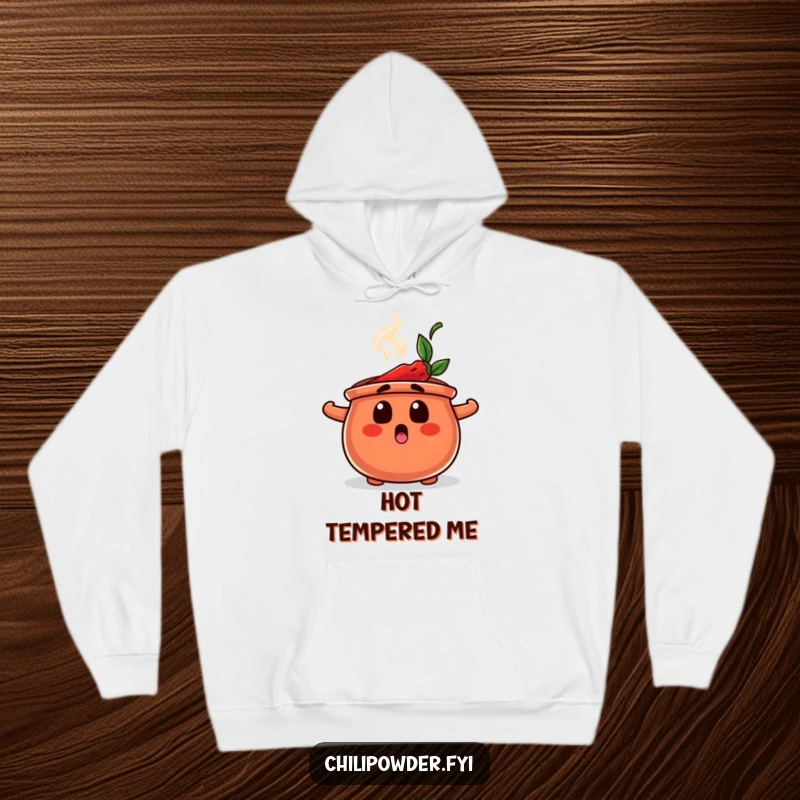 Funny hoodie showcasing a chili powder pot with a surprised face and steam, offering warmth and comical astonishment.